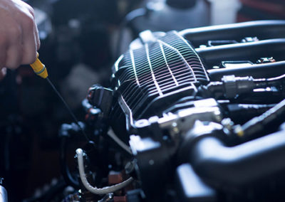 Car mechanic working in auto repair service